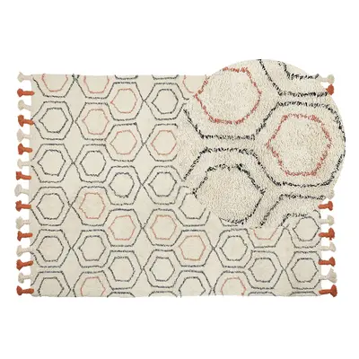 Area Rug Beige And Orange Cotton 140 X 200 Cm Geometric Pattern Hand Tufted Shaggy With Tassels